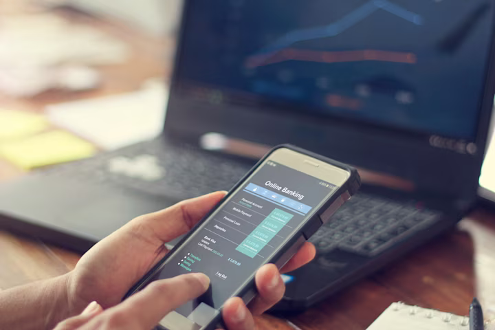 Person about to log out of an online financial mobile app
