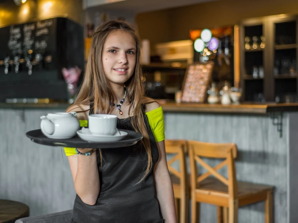 Student working as a waiter