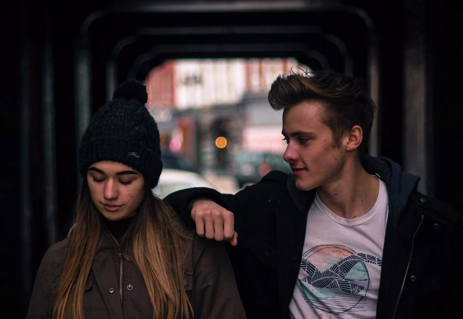 Teen couple walking in city
