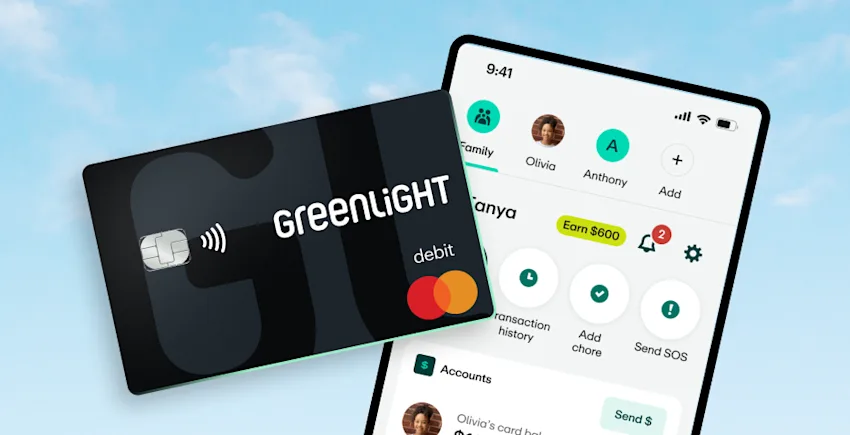 Greenlight debit card with app screen and sky background