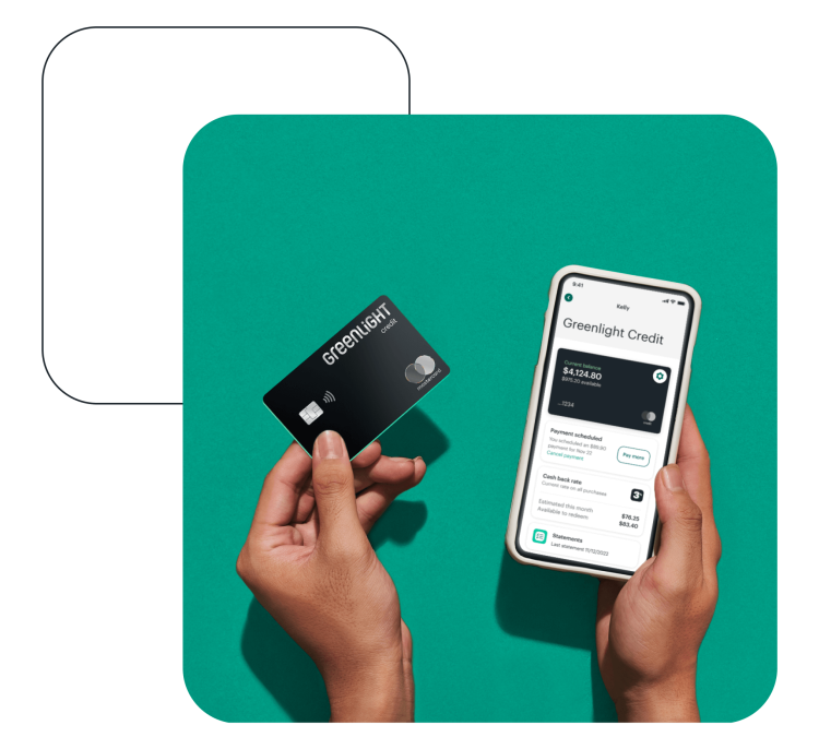 Person’s hands holding up Greenlight’s black family cash back credit card and mobile phone with app features against green background
