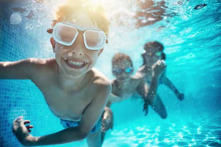 Kids swimming in pool