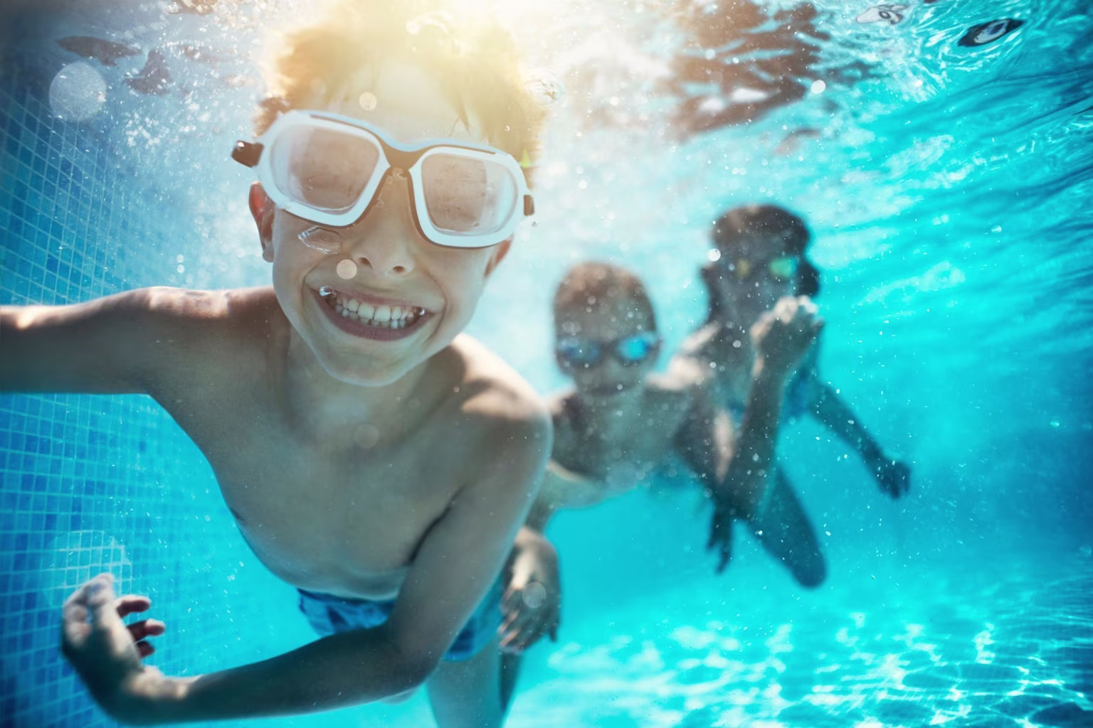 Kids swimming in pool