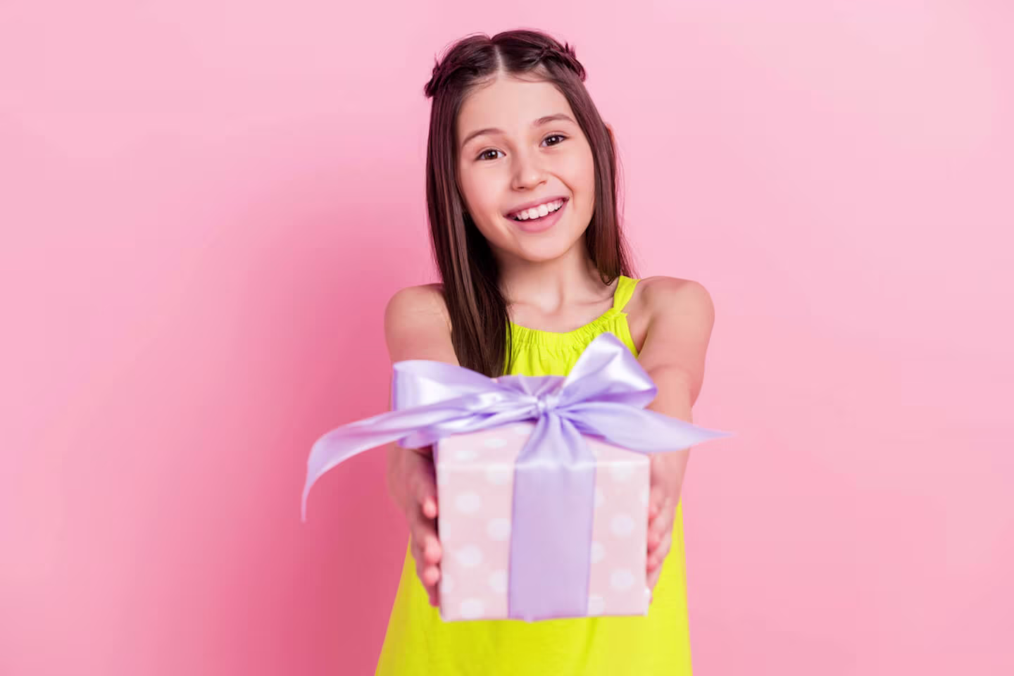 Girl handing a gift