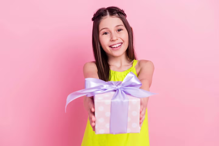 Girl handing a gift