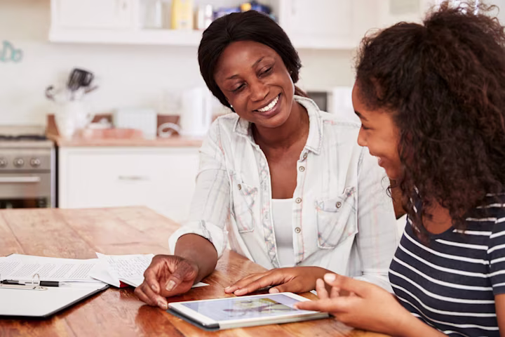 Active income vs passive income: mother helping her daughter