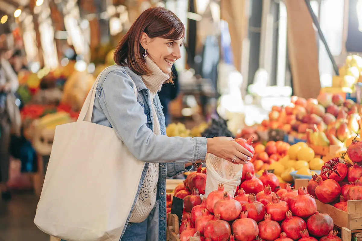 Woman buying a fruit