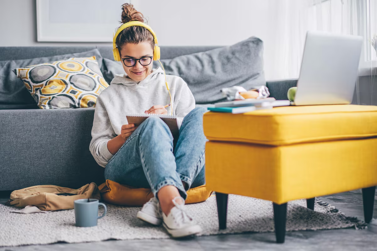 Woman writing in a notebook