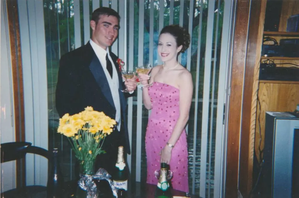 vintage image of nicely dressed man and woman enjoying a cocktail