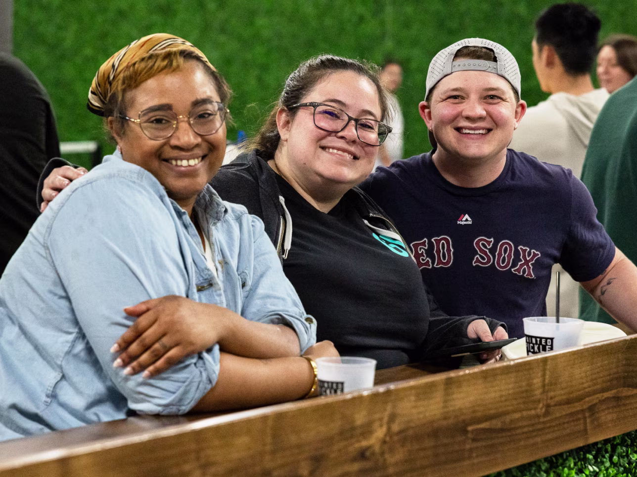 image of 3 female employees smiling together
