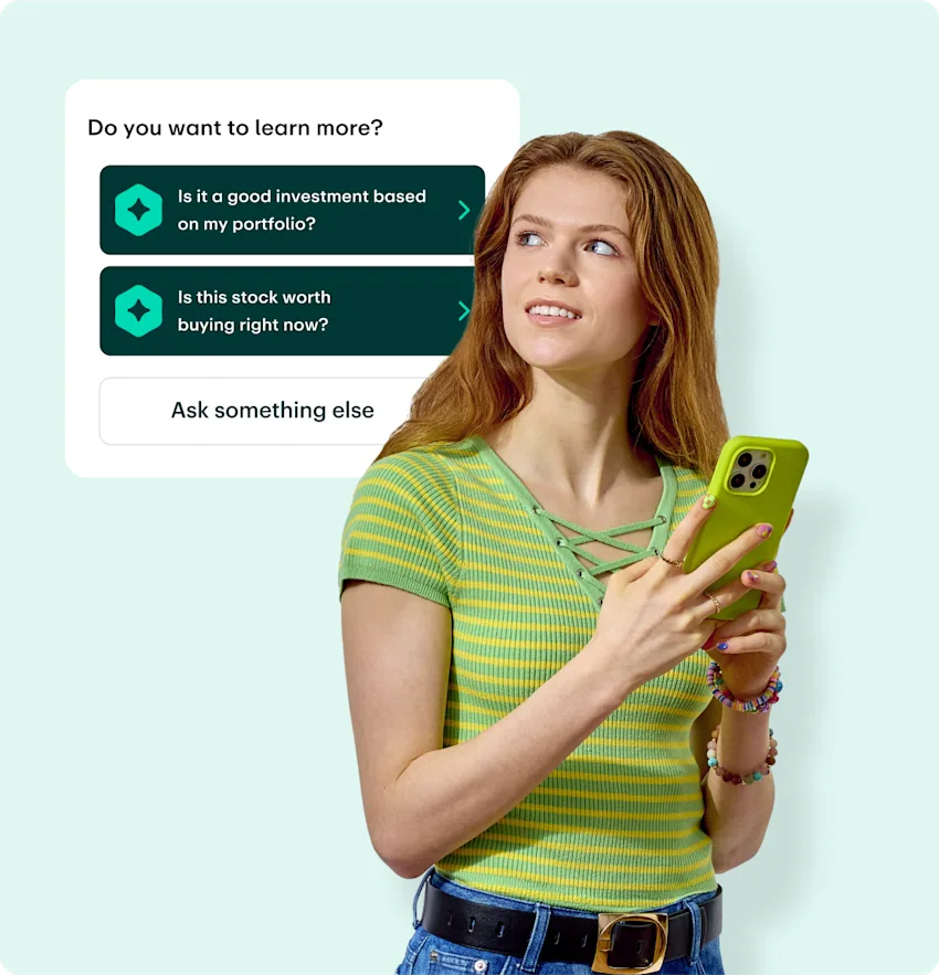 Person in green striped top holding phone with investment questions interface showing portfolio and stock inquiries.