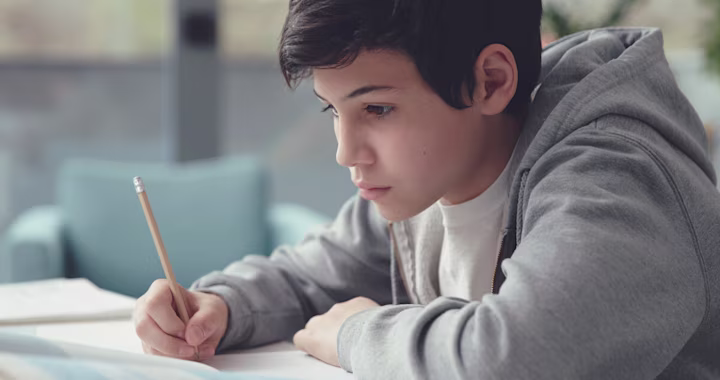 How to start a business as a kid: young teenager taking down notes