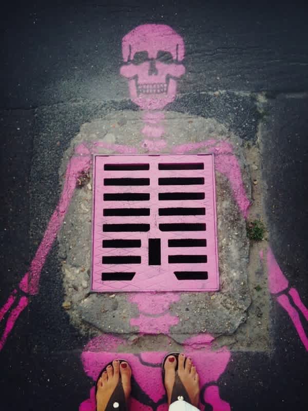 Skeletal Drain Graffiti Art Street art