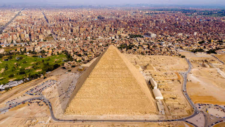 The Giza Great Pyramids modern giza city skyline