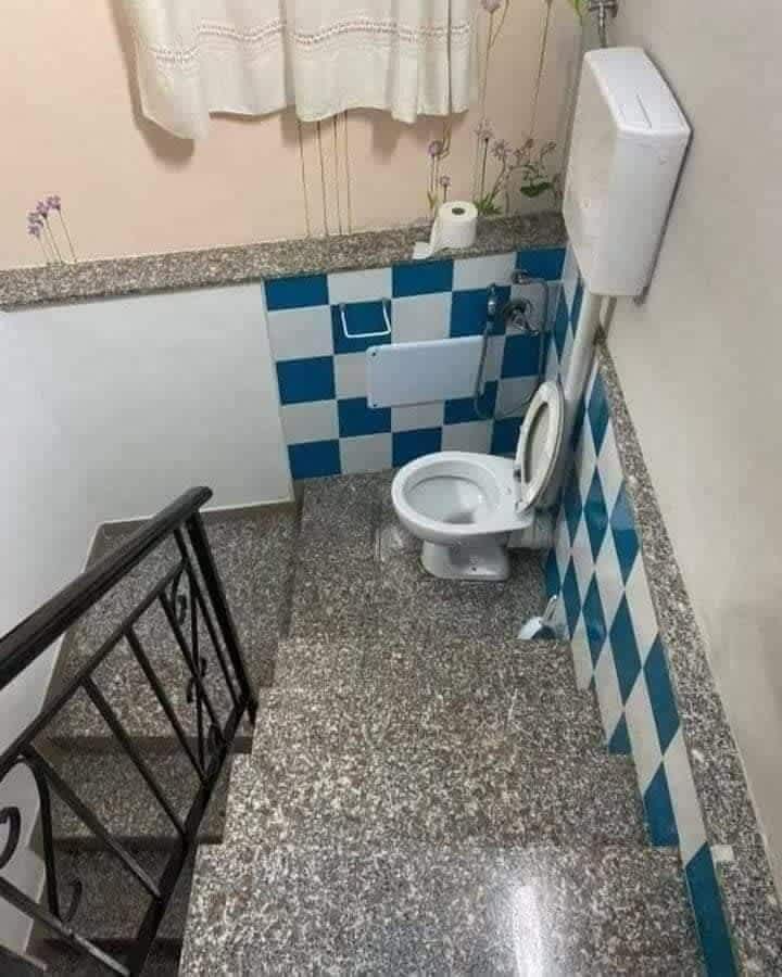 middle of the staircase toilet
