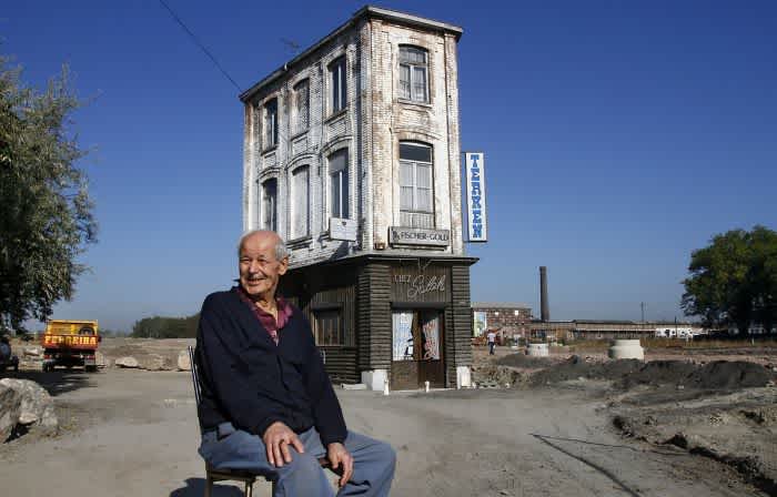 Stubborn Homeowners Who Refused To Move Last Café Standing