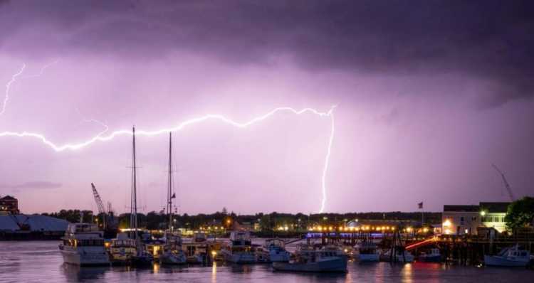 Perfect Timing Boat lightning photo