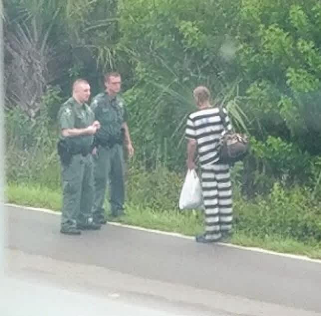 man in convict dress drug paraphernalia 