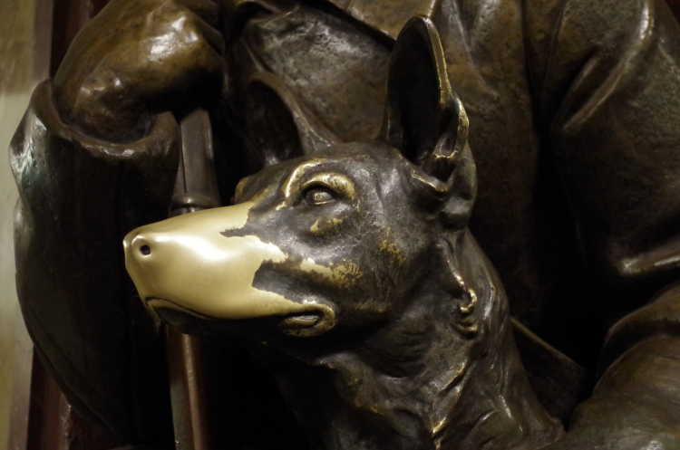 Moscow’s Metro Station dog statue worn brass