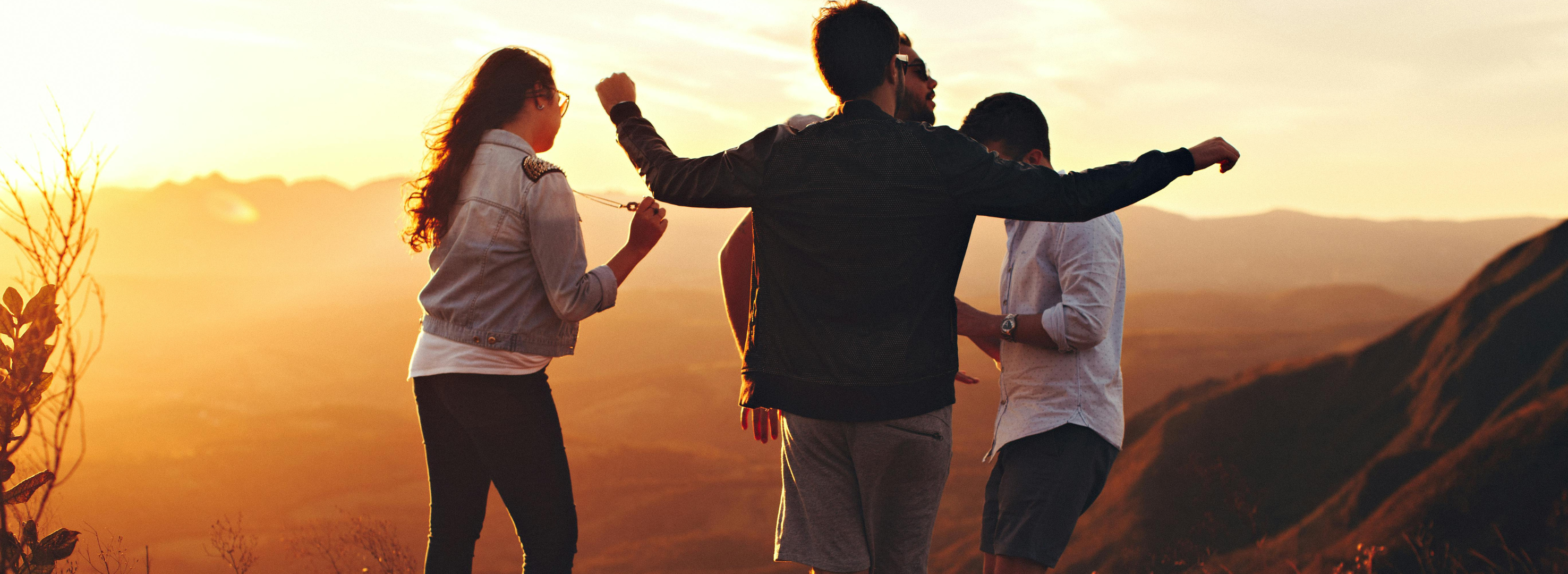 Students relaxing in the sunset