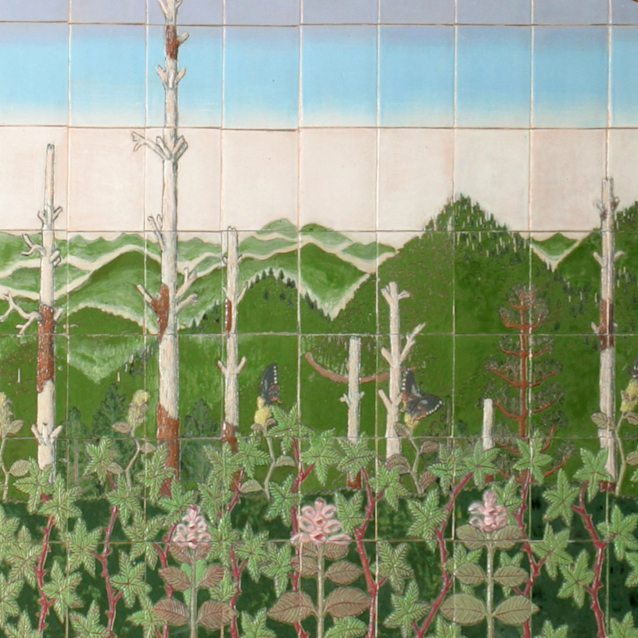 Arched tile mural depicting green forest with pink flowers, mountains, and blue sky, flanked by palm tree panels on blue.