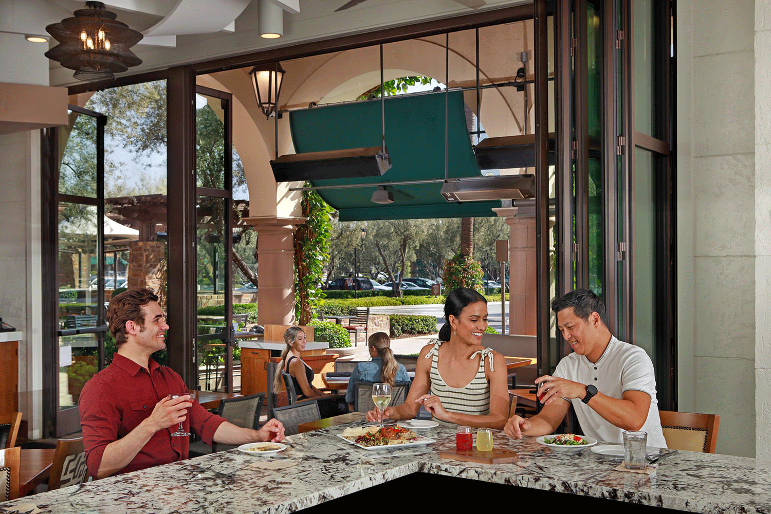  Interior view of customers eating at Zov's Bistro at Orchard Hills® Shopping Center