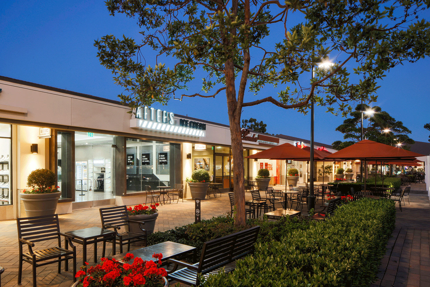 Exterior view of Westcliff Plaza at dusk
