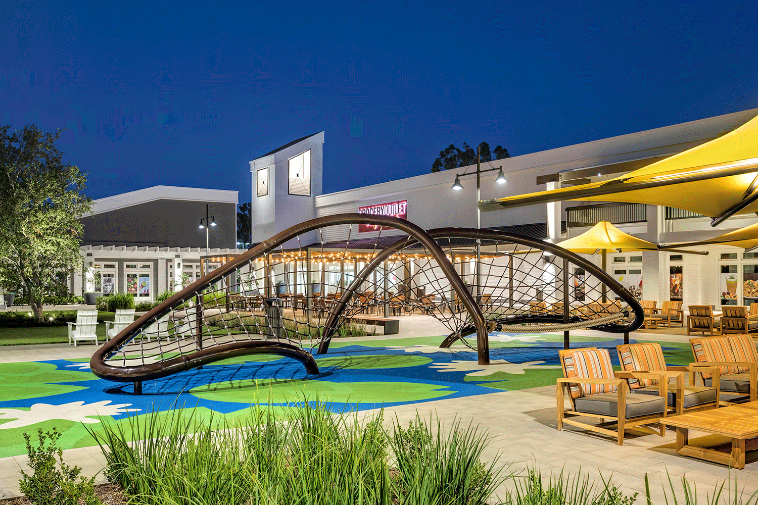  Night view of the play area at Woodbridge Village Center 