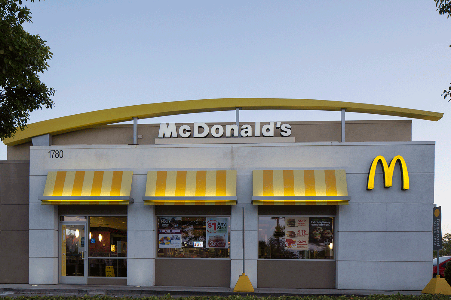  Exterior view of McDonald's at dusk in Venture Park