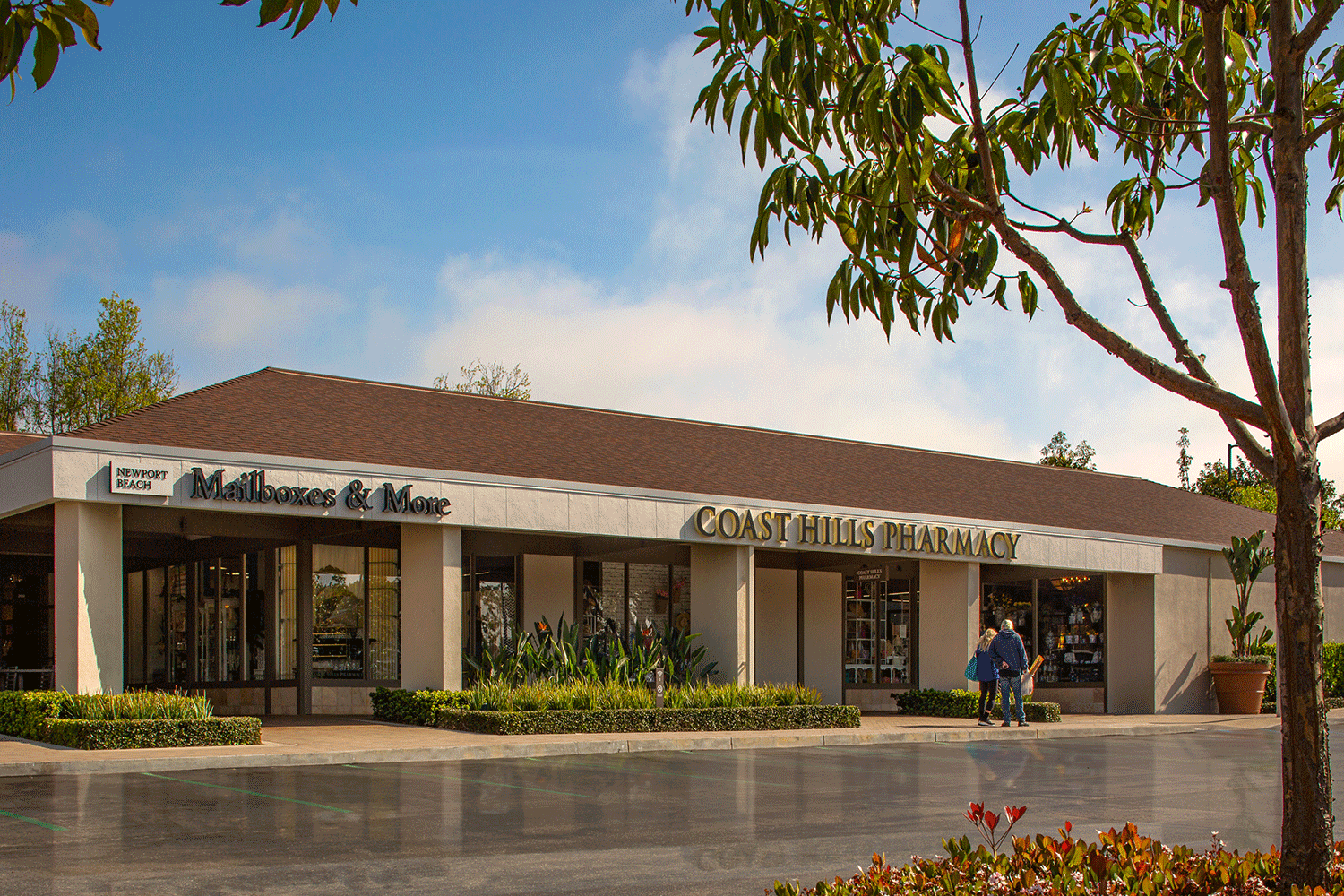  Exterior view of storefronts at Newport Hills Shopping Center 