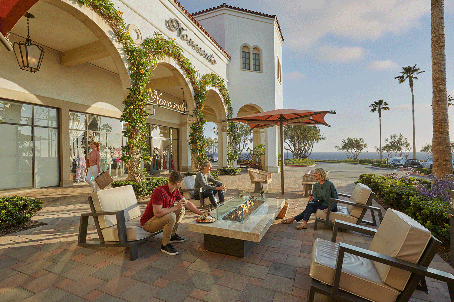  View of family talking at Crystal Cove Shopping Center 