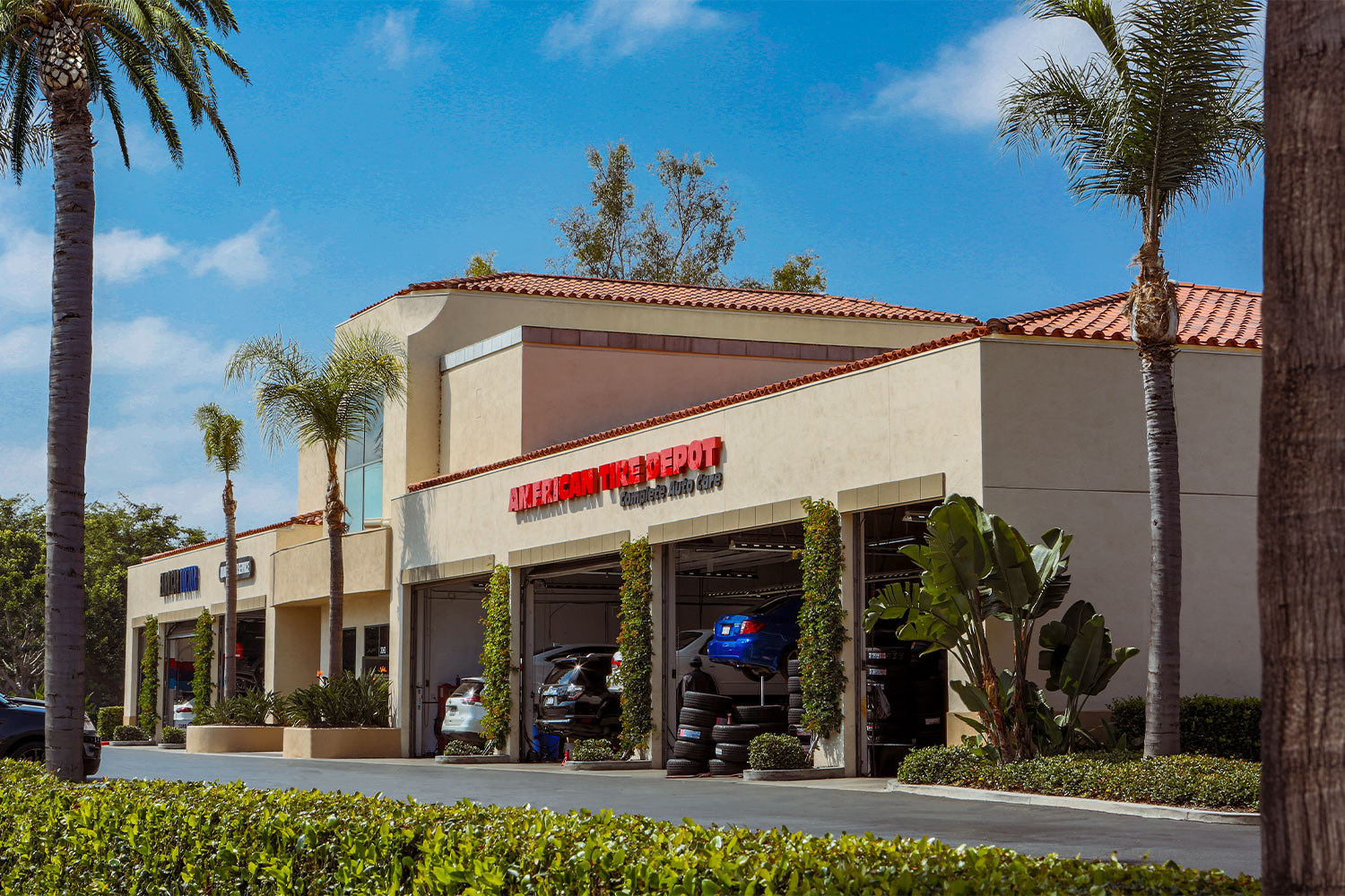  Day view of American Tire Depot at Harvard Place Auto Plaza