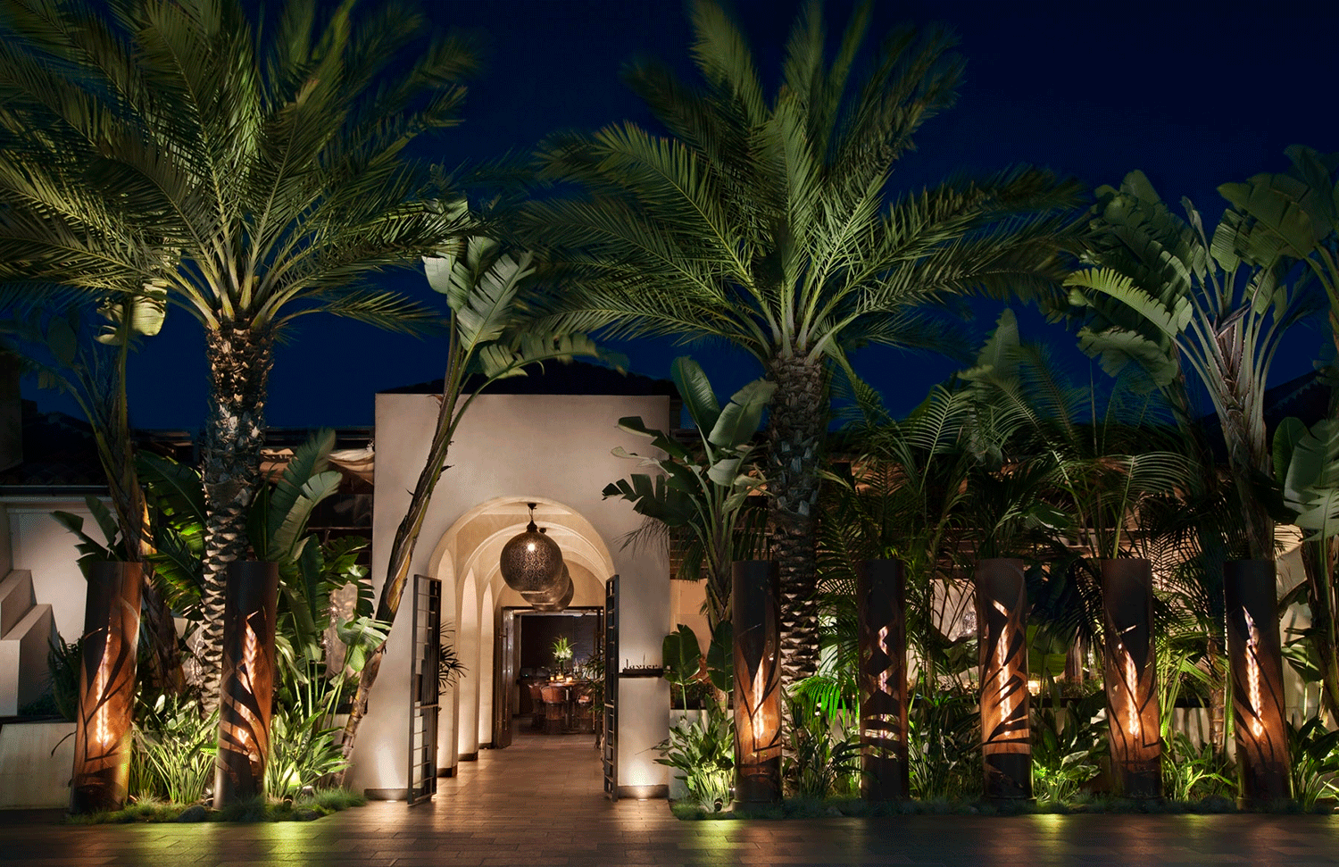  Entrance of the Crystal Cove Shopping Center at dusk