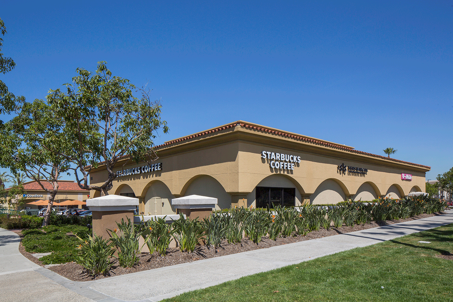  Exterior view of Starbucks at Westpark Plaza