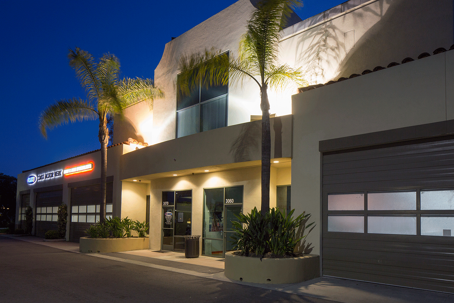  Exterior view at night of Harvard Place Auto Plaza