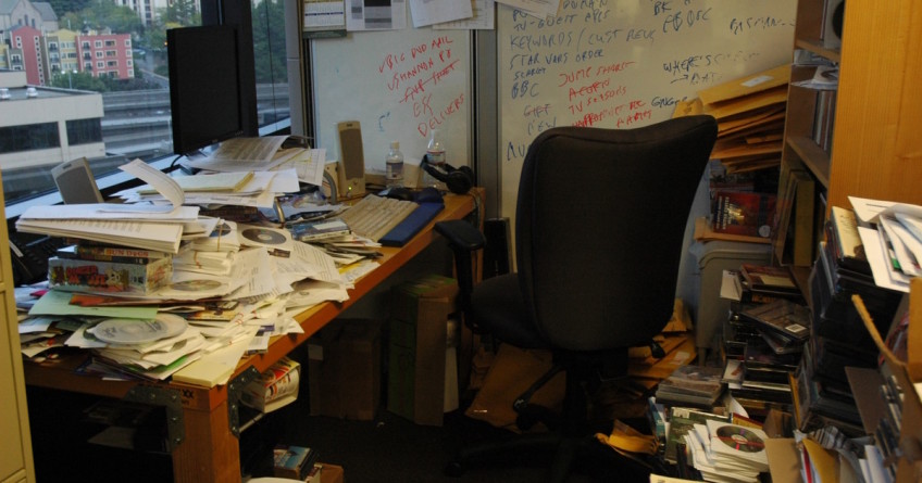 A cluttered office desk