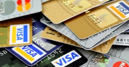 Stack of Visa and Mastercards – two of the most popular credit cards