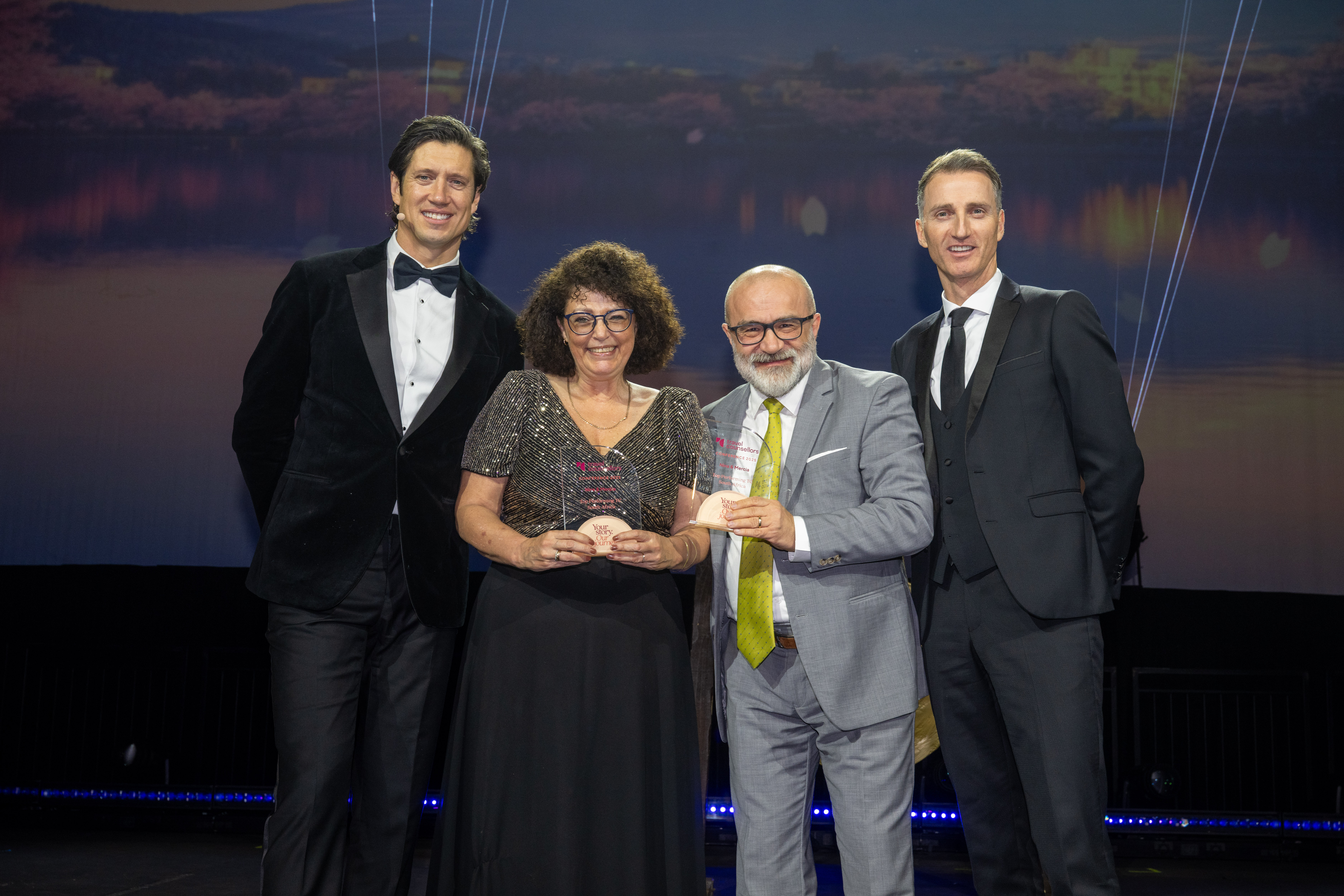 Mercia accepting award Top Travel Counsellors South Africa