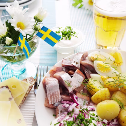 Sillkrans med smörstekt kavring och färskpotatis