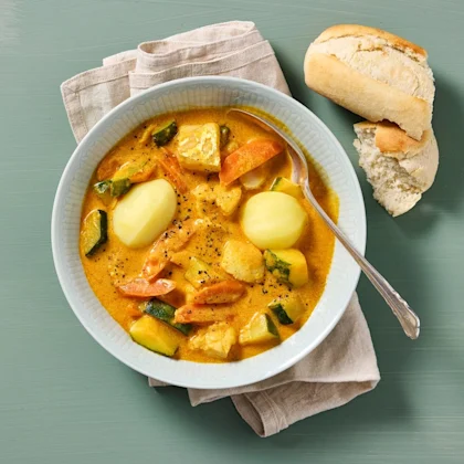 Fiskgryta med zucchini och tomat