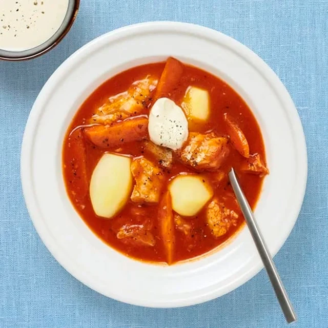 Fiskgryta med vitlökskräm