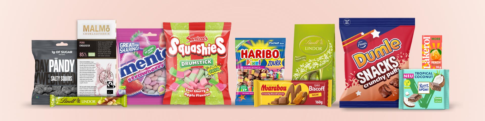 Olika godis- och chokladprodukter, bland annat från Pandy, Malmö Chokladfabrik, Mentos, Swizzels Squashies, Haribo, Lindt, Marabou Biscoff, Dumle Snacks, Läkerol och Ritter Sport, med texten “Klicka för att handla.”