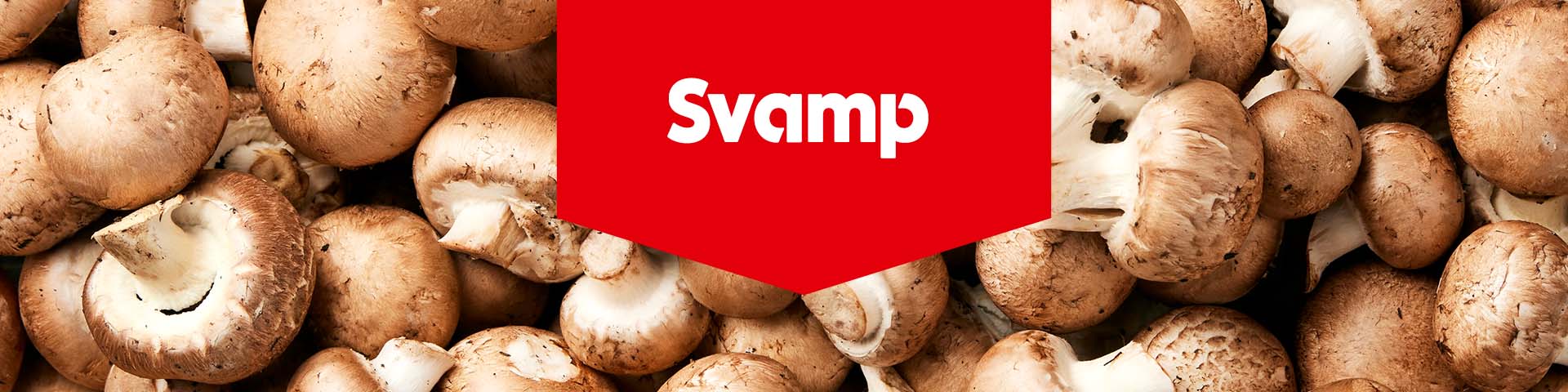 Färska champinjoner med texten "Svamp".