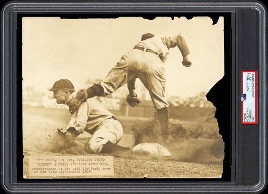 A vintage Type 1 authentic original photograph showing MLB HOFer Ty Cobb stealing a base fits nicely inside one of PSA’s Jumbo Holders.