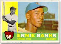 The 1960 Topps Banks card offers a colorful design