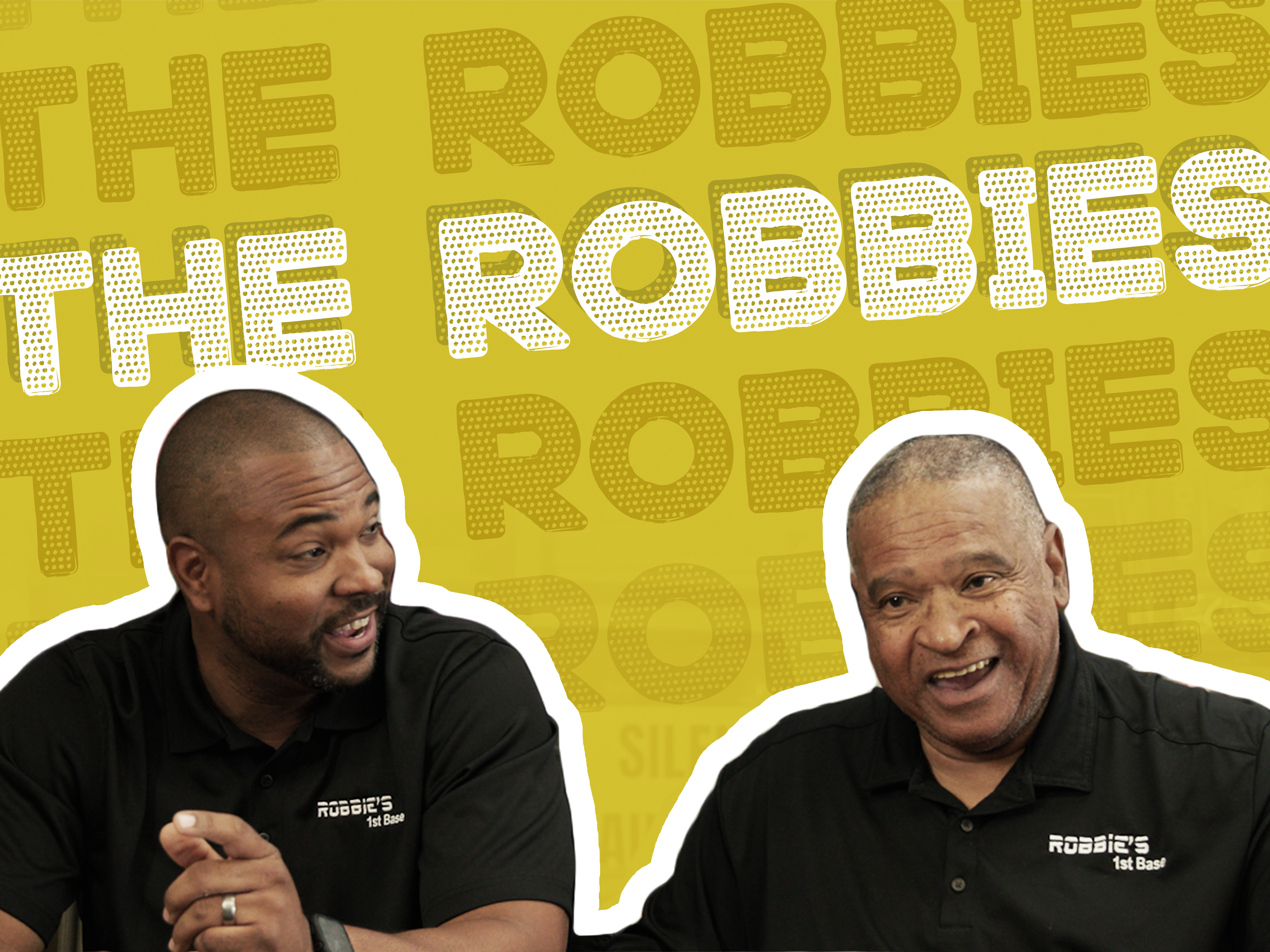 Robbie Sr. and Robbie Jr. laughing on gold background that says The Robbies