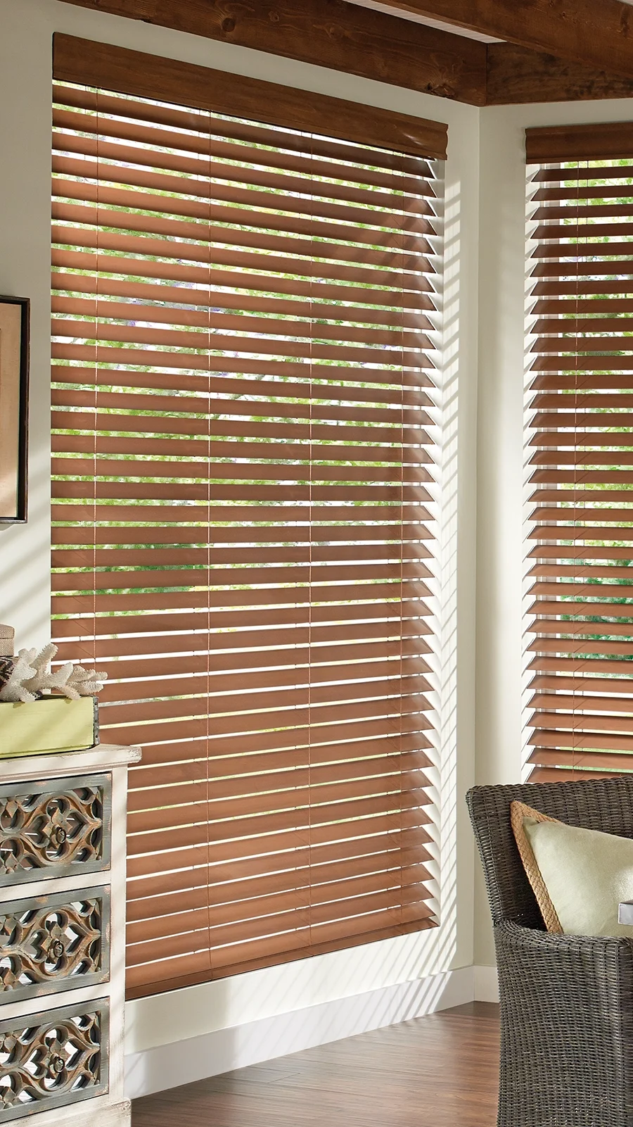 Wood blinds featured in rustic dining room.