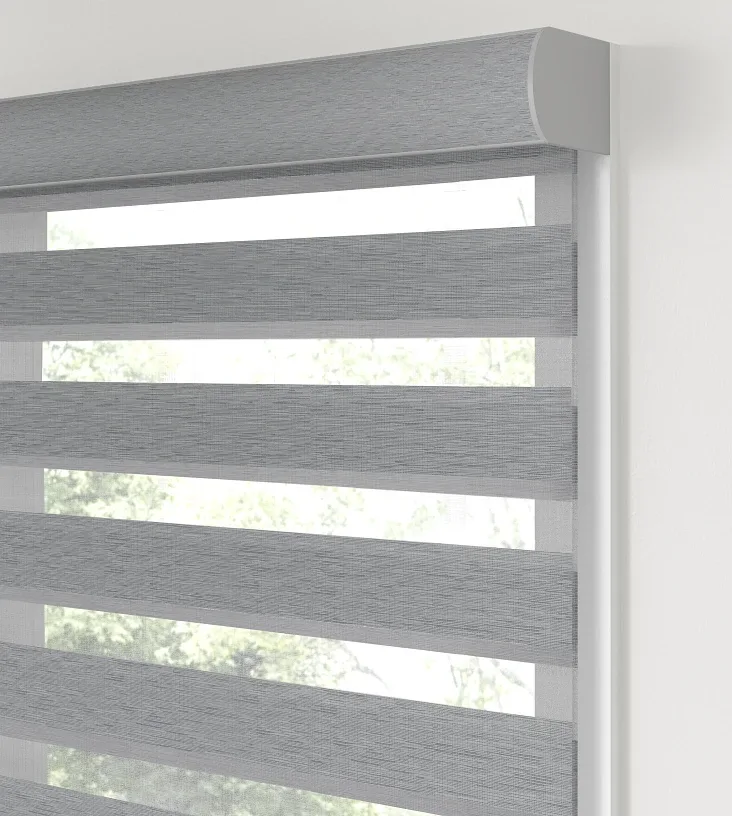 Banded shade MEDIUM cassette headrail with a fabric insert.