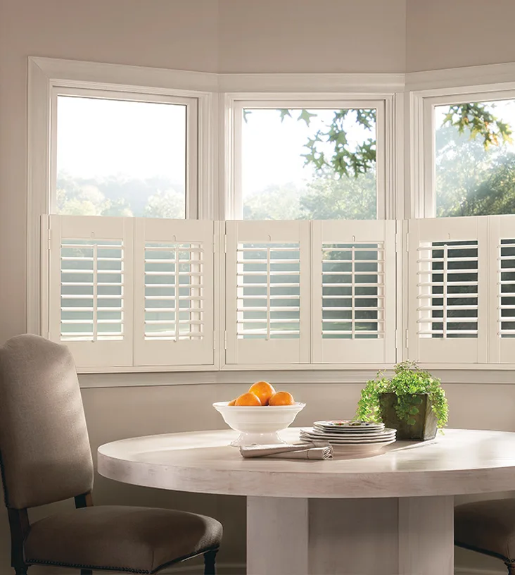 Half-height shutters that cover only the lower portion of a window, leaving the upper part exposed. 