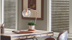 Faux wood blinds in a modern home office.